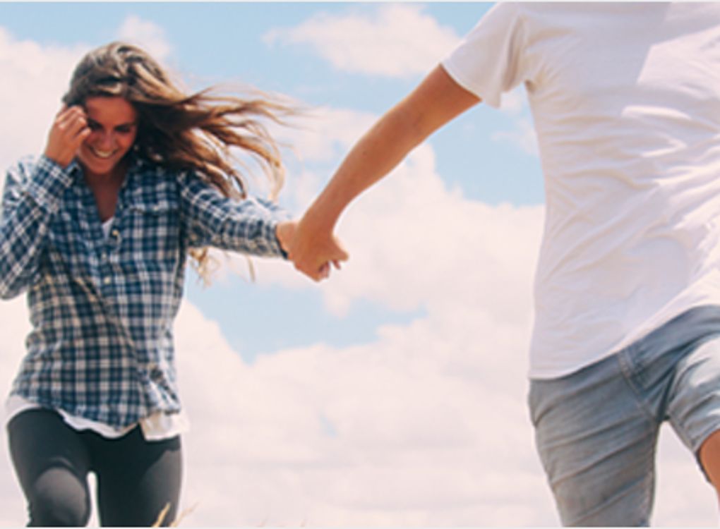 Couple holding hands