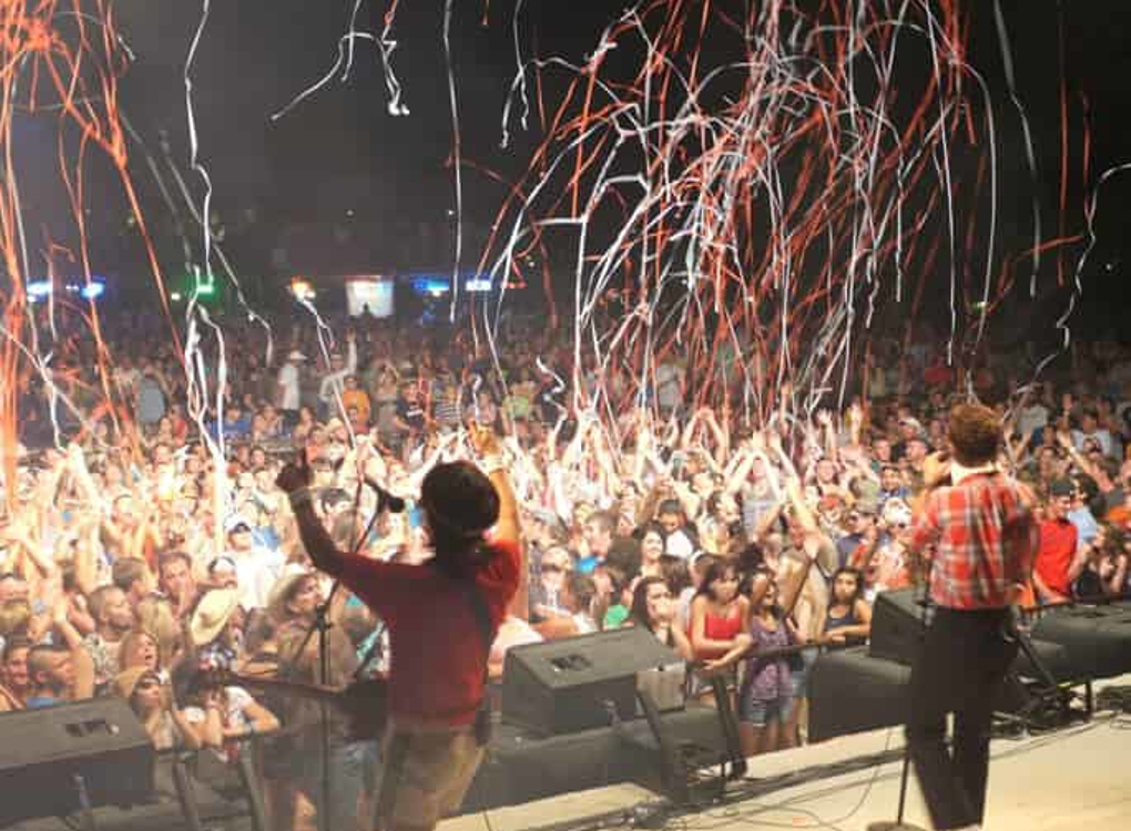 Photo of a band at a concert