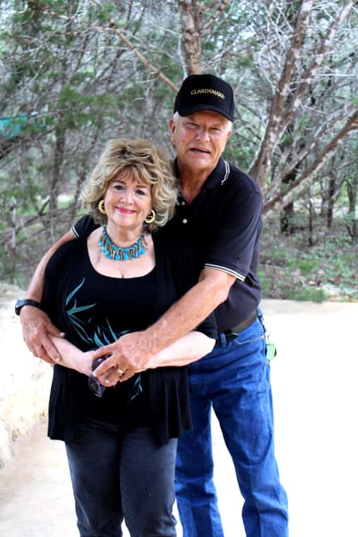 Man and woman smiling at camera